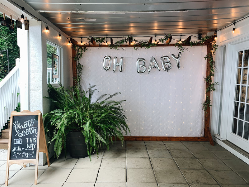 oh baby silver balloons with photo booth chalkboard sign
