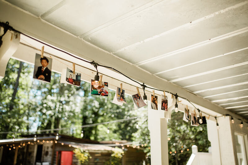 couple photos hanging on covered porch