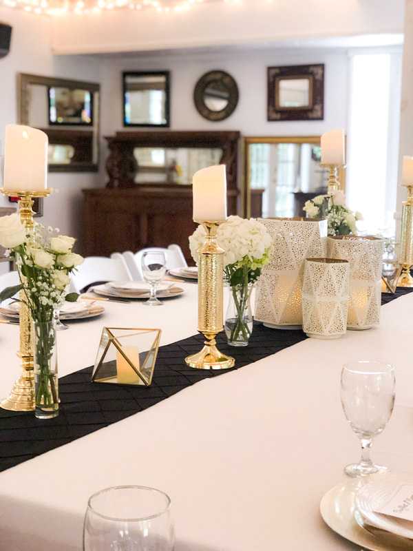 gold, black and white modern table decor