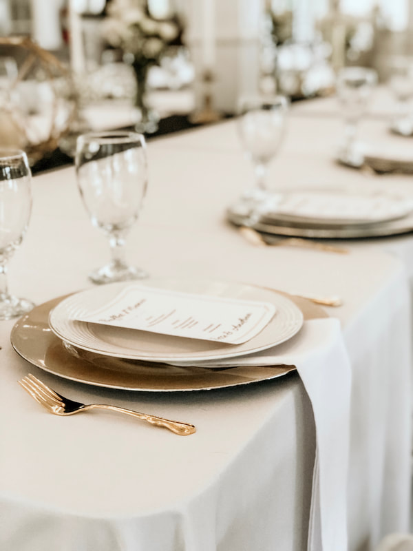menu and plate settings for rehearsal dinner