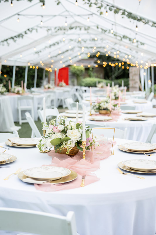 pink and cream tented reception tables